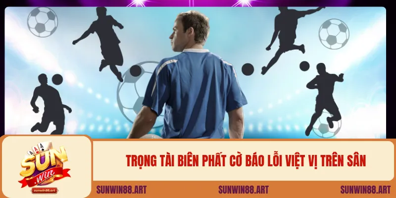 Trọng tài biên phất cờ báo lỗi việt vị trên sân